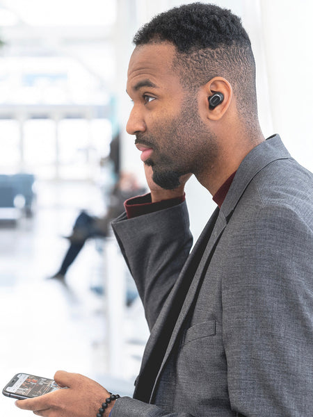 Man wearing Koss TWS250i True Wireless Ear Buds