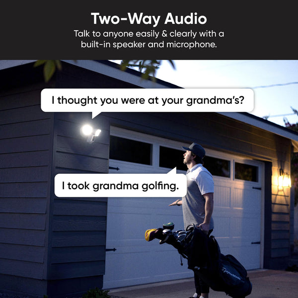 Man looking up at floodlight and speaking directly to it